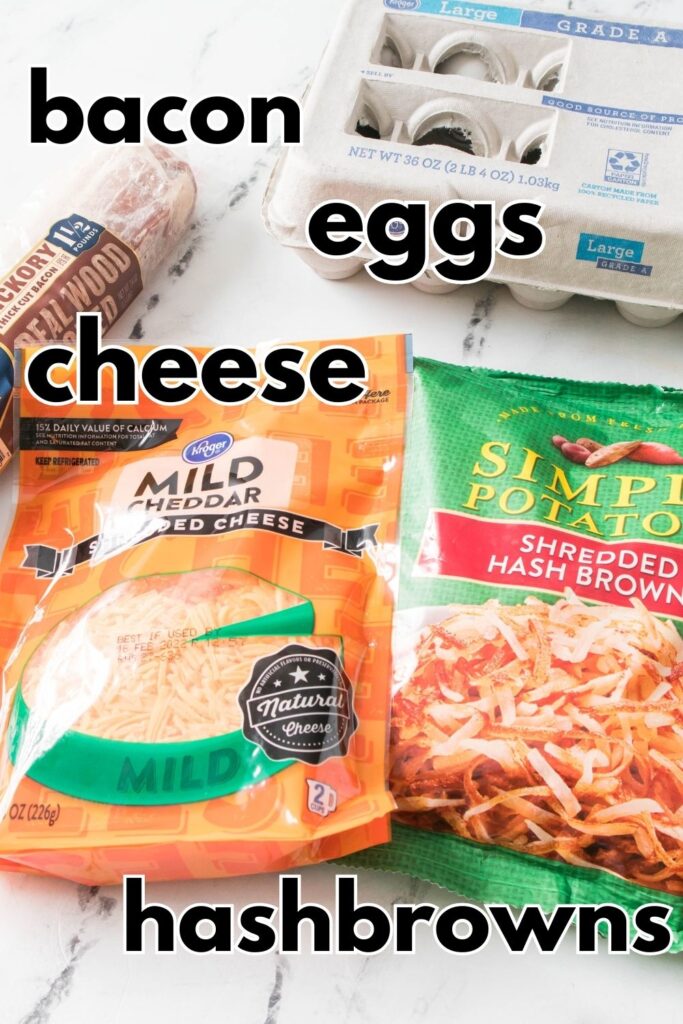 cheese, hashbrowns, eggs and bacon on a marble counter