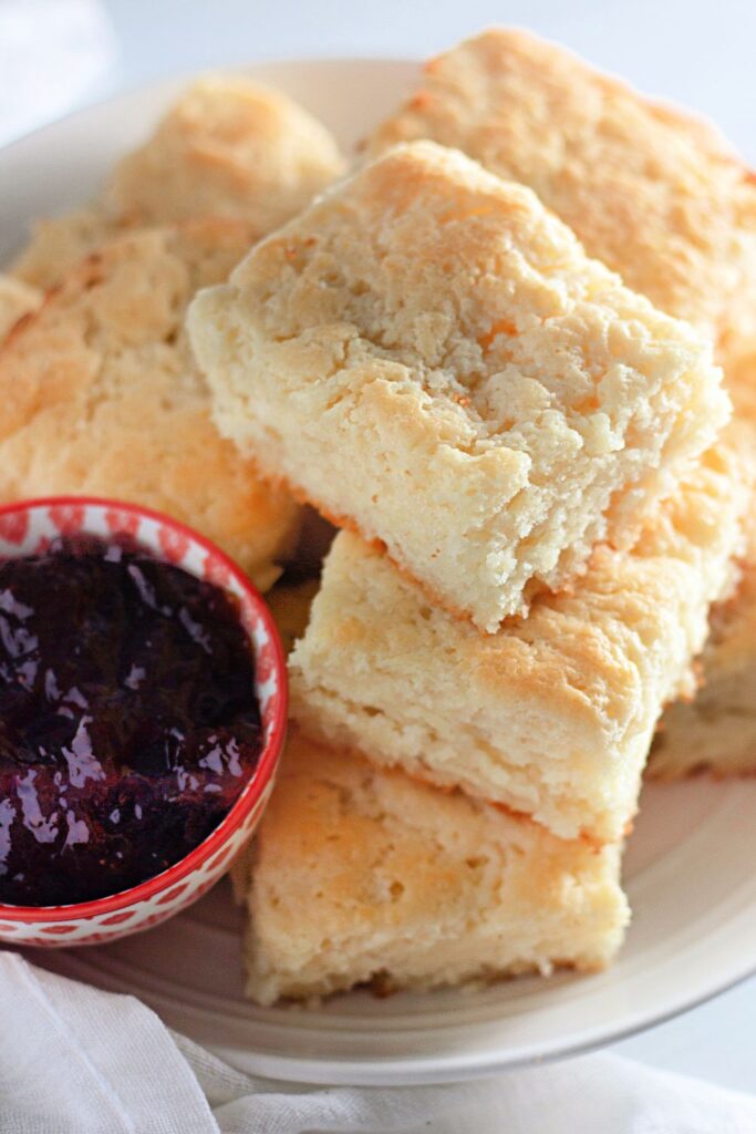 butter swim biscuits stacked on a plate