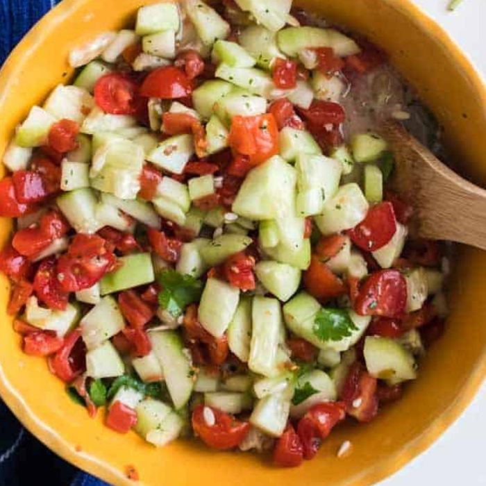 cucumber salsa in a yellow bowl on table