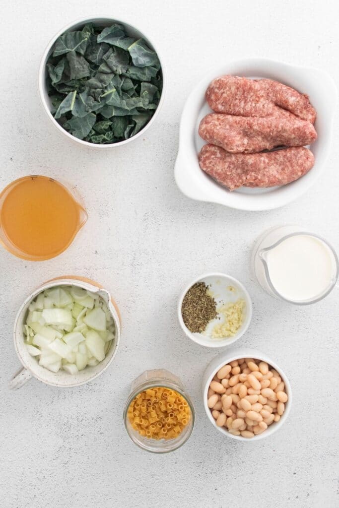ingredients for fagioli soup on table in single serve containers
