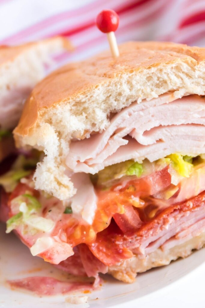 grinder sandwich on white plate